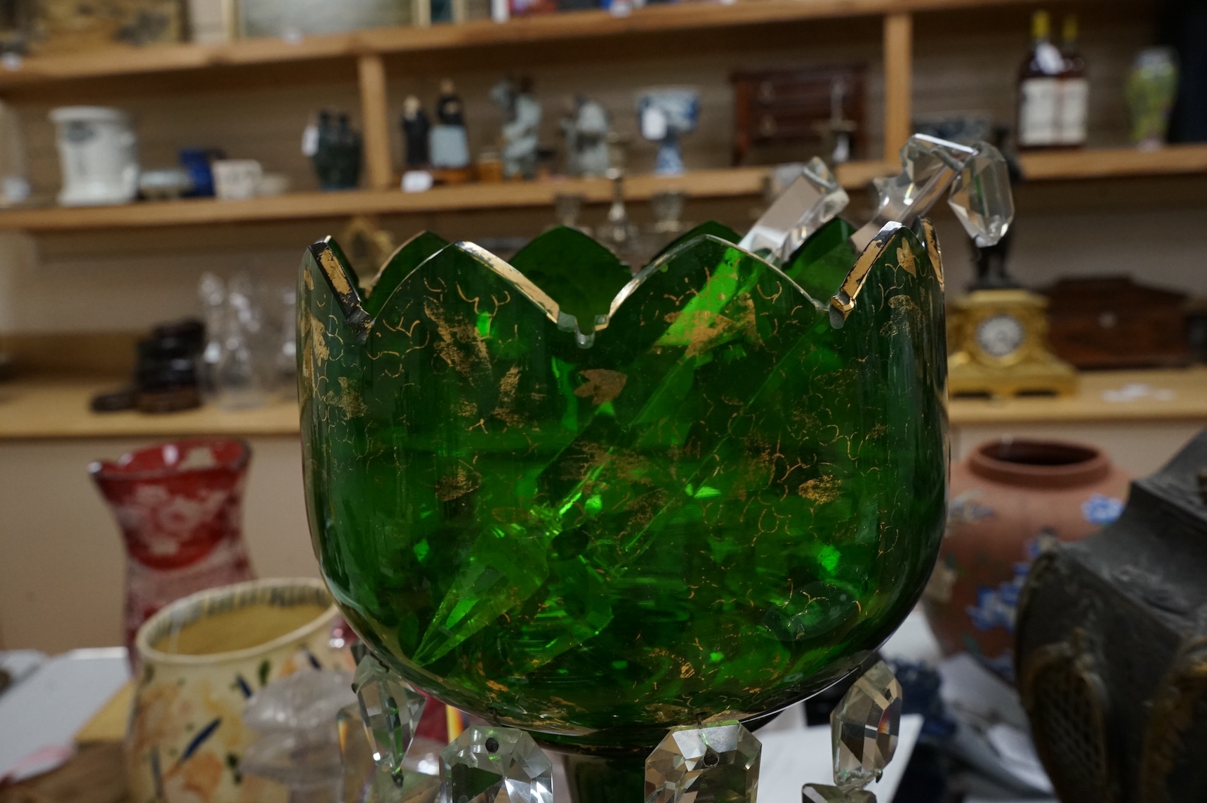 A large Victorian green glass lustre with drops, 45cm high